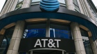 Signage is displayed outside an AT&T Inc. store in Chicago, Illinois, U.S., on Tuesday, Oct. 22, 2019. AT&T is scheduled to release earnings figures on October 28. Photographer: Taylor Glascock/Bloomberg