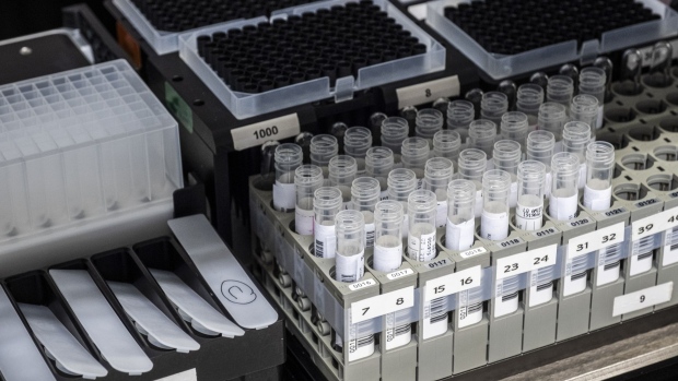 A rack of test tubes sit inside a ribonucleic acid (RNA) extractor during coronavirus symptom detection tests at the LBM LxBio medical biology laboratory in Rodez, France, on Wednesday, April 1, 2020. 
