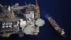 The Kobe Chouest platform supply vessel sits anchored next to the Chevron Corp. Jack/St. Malo deepwater oil platform in the Gulf of Mexico in the aerial photograph taken off the coast of Louisiana, U.S., 
