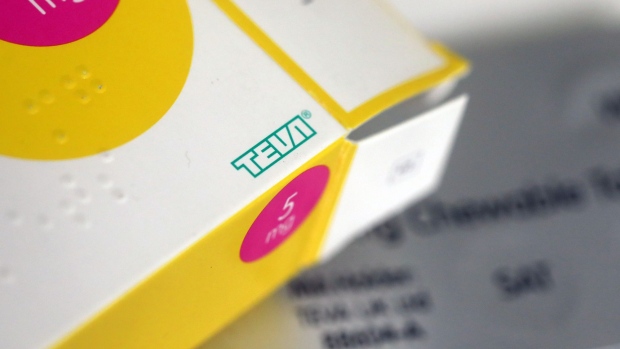 The Teva Pharmaceutical Industries Ltd. logo sits on a box of tablets on a pharmacy counter in this arranged photograph in London, U.K., on Thursday, Dec. 29, 2016. The rapid pace of innovation among drugmakers may continue to be overshadowed by broader investment themes, such as the switch away from defensive stocks into more cyclical industries, during 2017, according to Bloomberg Intelligence. Photographer: Chris Ratcliffe/Bloomberg