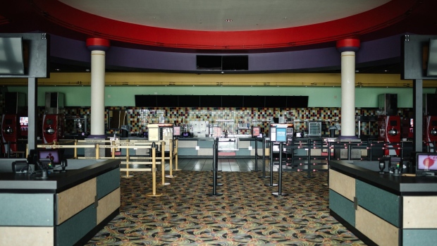 A lobby is empty at a temporarily closed movie theater in Cartersville, Georgia on April 22. Photographer: Dustin Chambers/Bloomberg