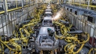 Sparks fly as Hyundai Corp. robotic arms weld panels of automobiles on the production line at the Kia Motors Slovakia plant in Zilina, Slovakia, on Monday, May 14, 2018. Kia's Zilina factory assembles Sportage SUVs as well as cee'd and Venga models. Last year it produced 335,600 vehicles and 539,987 engines. Photographer: Akos Stiller/Bloomberg