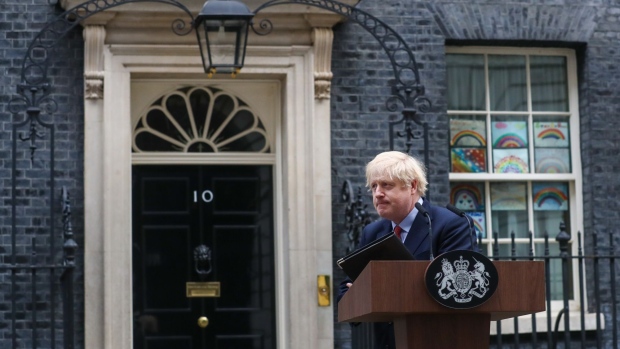 Boris Johnson departs after delivering a statement outside number 10 Downing Street in London on April 27. Photographer: Simon Dawson/Bloomberg