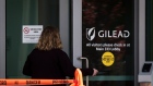 A person enters a building at Gilead headquarters in Foster City, California on March 19. Photographer: David Paul Morris/Bloomberg