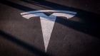 A Tesla Inc. logo marks an empty parking bay at a Supercharger station in Sant Cugat, Spain, on Wednesday, July 10, 2019. Tesla is poised to increase production at its California car plant and is back in hiring mode, according to an internal email sent days after the company wrapped up a record quarter of deliveries. Photographer: Angel Garcia/Bloomberg