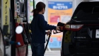 A customer refuels a vehicle at an Idemitsu Kosan Co. gas station in Yokohama
