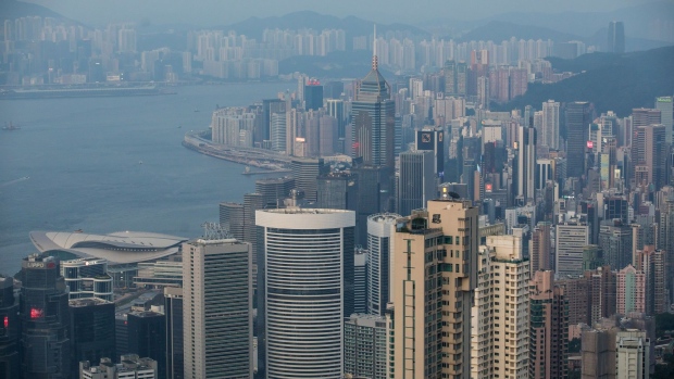 Buildings are seen from Victoria Peak in Hong Kong, China, on Wednesday, Aug. 28, 2019. Hong Kong's hotel industry is struggling with a collapse in bookings after thousands of protesters shut down flights from the territory's airport in an escalation of months of clashes with police. Photographer: Paul Yeung/Bloomberg