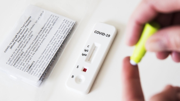 An at-home Covid-19 antibody rapid test cassette. Photographer: Adam Glanzman/Bloomberg