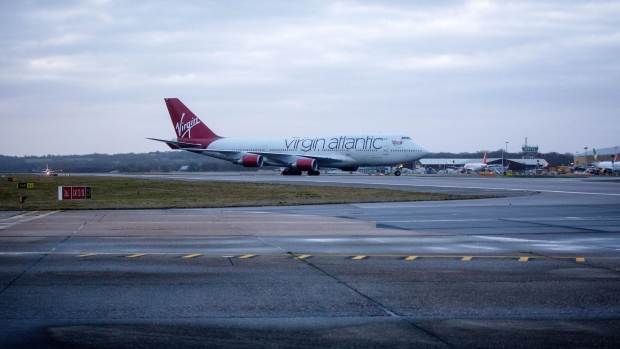 A Virgin Atlantic aircraft taxis after landing at London Gatwick Airport in Crawley, U.K. in 2017. Photographer: Simon Dawson/Bloomberg