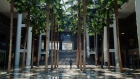 A man walks across the empty atrium of a shopping mall in Manhattan on May 5.