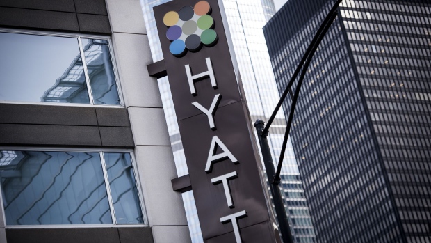Signage is displayed outside the Hyatt Place hotel in Chicago, Illinois, U.S., on Monday, Oct. 30, 2017. Hyatt Hotels Corp. is scheduled to release earnings figures on November 2. Photographer: Christopher Dilts/Bloomberg