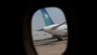 The tail fin of a Boeing B-737 airliner, operated by Saudi Aramco, stands at the company's own airport terminal in Dhahran, Saudi Arabia, on Tuesday, Oct. 2, 2018. Saudi Aramco aims to become a global refiner and chemical maker, seeking to profit from parts of the oil industry where demand is growing the fastest while also underpinning the kingdom’s economic diversification.