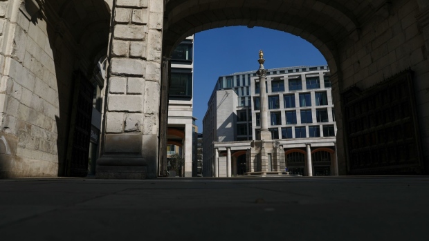 The Paternoster Square Column stands in the empty square outside the London Stock Exchange in London on April 9. Photographer: Simon Dawson/Bloomberg