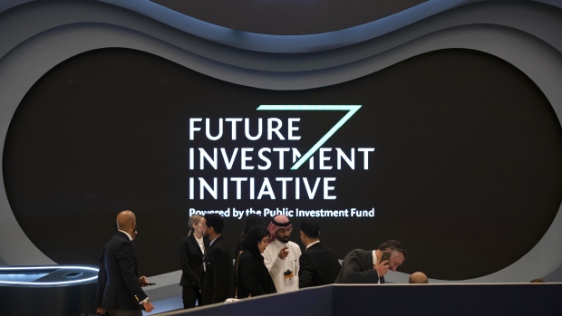 An advertisement sponsored by the Public Investment Fund (PIF) sits on display on the opening day of the Future Investment Initiative (FII) forum at the Ritz Carlton hotel in Riyadh, Saudi Arabia, on Tuesday, Oct. 29, 2019. Central banks have run out of firepower to fight the next economic downturn, according to global finance chiefs gathered at an investment forum in Saudi Arabia on Tuesday. Photographer: Faisal Al Nasser/Bloomberg