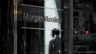 A pedestrian is reflected in the exterior of Morgan Stanley headquarters in New York. Photographer: Bess Adler/Bloomberg
