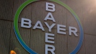 The Bayer AG logo sits on the exterior of the company's pharmaceutical factory in Berlin, Germany, on Wednesday, March 20, 2019. 