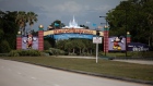 The Walt Disney World Resort stands temporarily closed in Orlando on May 15. Photographer: Charlotte Kesl/Bloomberg