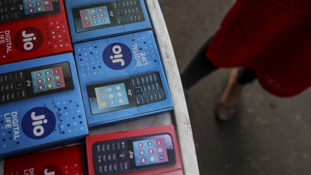 Boxes of Reliance Jio, the mobile network of Reliance Industries sit on display in Mumbai on Feb. 3. Photographer: Dhiraj Singh/Bloomberg