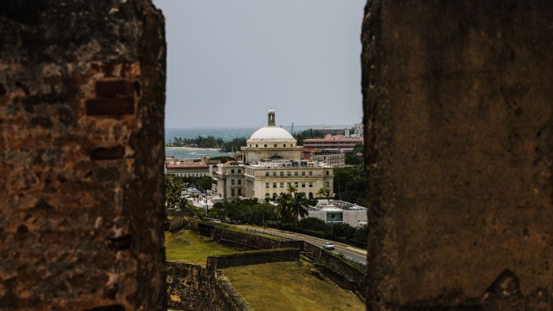 The Capitol Building is seen past walls in the Old City of San Juan, Puerto Rico.