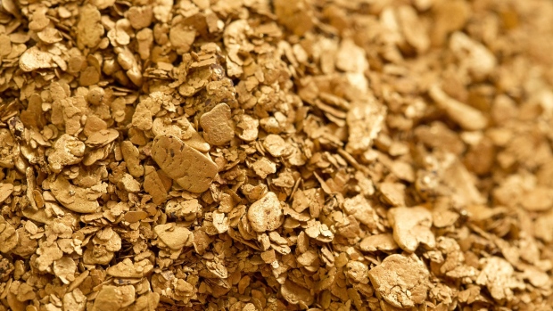 Gold nuggets sit in a container ahead of refining at the JSC Krastsvetmet non-ferrous metals plant in Krasnoyarsk, Russia, on Tuesday, Nov. 5, 2019. Gold headed for the biggest weekly loss in more than two years as progress in U.S-China trade talks hammered demand for havens and sent miners shares tumbling. Photographer: Bloomberg/Bloomberg