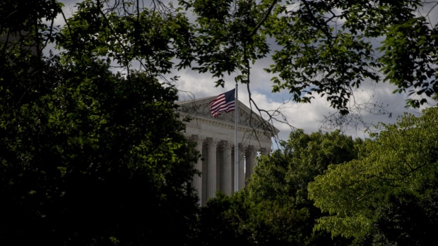 The U.S. Supreme Court stands in Washington, D.C., U.S., on Tuesday, May 12, 2020. Lawmakers continue negotiations over the next round of coronavirus stimulus legislation, with a Senate Democrat saying today that a handful of Republicans could be on board with a proposal to send $500 billion in funding to states. Photographer: Eric Thayer/Bloomberg