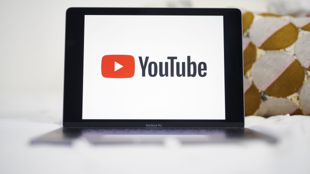 The logo for YouTube Inc. is displayed on a laptop computer in an arranged photograph taken in the Brooklyn borough of New York, U.S., on Sunday, May 10, 2020. The video arm of Alphabet Inc.'s Google is offering new tools and audience statistics specifically for advertising on TV - screen space where YouTube has trailed cable channel. Photographer: Gabby Jones/Bloomberg