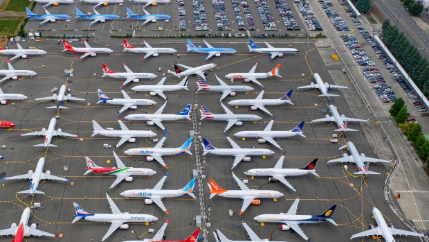 https://www.bnnbloomberg.ca/polopoly_fs/1.1441739.1590596442!/fileimage/httpImage/image.jpg_gen/derivatives/landscape_620/seattle-wa-june-27-boeing-737-max-airplanes-are-stored-on-employee-parking-lots-near-boeing-field-on-june-27-2019-in-seattle-washington-after-a-pair-of-crashes-the-737-max-has-been-grounded-by-the-faa-and-other-aviation-agencies-since-march-13-2019-the-faa-has-reportedly-found-a-new-potential-flaw-in-the-boeing-737-max-software-update-that-was-designed-to-improve-safety-photo-by-stephen-brashear-getty-images-photographer-stephen-brashear-getty-images-north-america.jpg