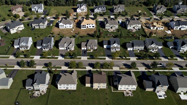 Homes at the Toll Brothers Inc. Bowes Creek Country Club community in an aerial photograph taken over Elgin, Illinois. Photographer: Daniel Acker/Bloomberg
