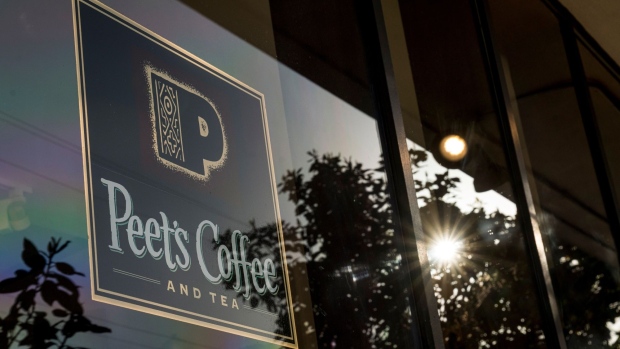Packages of espresso is displayed in a window of Peet's Coffee & Tea store in Berkeley, California, U.S., on Wednesday, May 20, 2020. JAB Holdings NV, the investment fund backed by the billionaire Reimann family, plans to raise as much as 2 billion euros ($2.2 billion) by listing its coffee business, showing that the resilience of the beverage during the coronavirus pandemic could end up driving Europe's biggest stock-market debut in more than a year. Photographer: David Paul Morris/Bloomberg