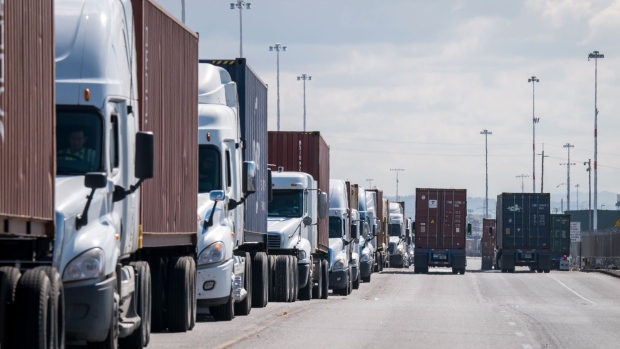 https://www.bnnbloomberg.ca/polopoly_fs/1.1442879.1590757006!/fileimage/httpImage/image.jpg_gen/derivatives/landscape_620/trucks-wait-in-line-to-enter-the-port-of-oakland-in-oakland-california-u-s-on-thursday-march-19-2020-the-spread-of-the-coronavirus-pandemic-is-scrambling-supply-chains-in-everything-from-crude-oil-to-copper-and-foodstuffs-with-many-countries-reporting-a-shortage-of-containers-photographer-david-paul-morris-bloomberg.jpg