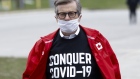 John Tory wears a protective mask before delivering meals to healthcare workers in Toronto on April 