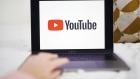 The logo for YouTube is displayed on a laptop computer. Photographer: Gabby Jones/Bloomberg