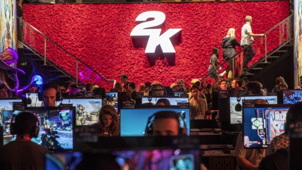Attendees play Borderlands 3 video game by Take-Two during the E3 Expo in Los Angeles in 2019.  Photographer: Kyle Grillot/Bloomberg