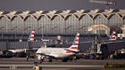 An American Airlines Group Inc. Embraer 175 plane taxis at Reagan National Airport (DCA) in Arlington, Virginia, U.S., on Monday, April 6, 2020. U.S. airlines are applying for federal aid to shore up their finances as passengers stay home amid the coronavirus pandemic. Photographer: Andrew Harrer/Bloomberg
