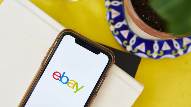 The logo for eBay Inc. is displayed on a smartphone in an arranged photograph taken in the Brooklyn borough of New York, U.S., on Sunday, May 10, 2020. There has been "a meaningful structural change" in U.S. retail, with more and more money shifting to e-commerce during the pandemic, according to Baird. Photographer: Gabby Jones/Bloomberg