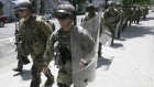 Members of an airborne military unit march outside the U.S. Treasury Building in Washington, DC. on June 4.