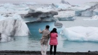 JOKULSARLON, ICELAND - JUNE 09: Visitors enjoy the view of Icebergs that calved from glaciers on June 3, 2017 in Jokulsarlon, Iceland. Iceland's tourism industry continues to thrive; just eight years ago Iceland welcomed approximately 464,000 tourists and by last year nearly 1.7 million people visited the nation. (Photo by Joe Raedle/Getty Images) Photographer: Joe Raedle/Getty Images Europe