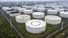 Oil storage tanks are seen in this aerial photograph taken on the outskirts of Ningbo, Zhejiang Province, China, on Wednesday, April 22, 2020. China's top leaders softened their tone on the importance of reaching specific growth targets this year during the latest Politburo meeting on April 17, saying the nation is facing "unprecedented" economic difficulty and signaling that more stimulus was in the works. Photographer: Qilai Shen/Bloomberg