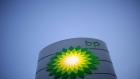 A BP Plc company logo stands illuminated on a sign on the forecourt of a gas station in London, U.K. Photographer: Matthew Lloyd