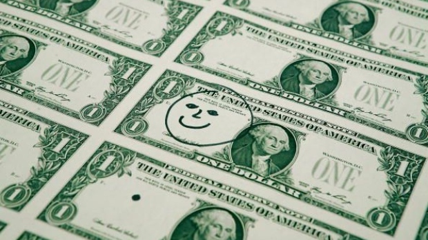 WASHINGTON - MARCH 26: A smiley face was drawn on a one dollar bill to test the defect procedure at the Bureau of Engraving and Printing on March 26, 2009 in Washington, DC. The roots of The Bureau of Engraving and Printing can be traced back to 1862, when a single room was used in the basement of the main Treasury building before moving to its current location on 14th Street in 1864. The Washington printing facility has been responsible for printing all of the paper Federal Reserve notes up until 1991 when it shared the printing responsibilities with a new western facility that opened in Fort Worth, Texas. (Photo by Mark Wilson/Getty Images)