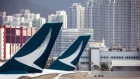 Tail fins of Cathay Pacific Airways Ltd. aircraft are seen at Hong Kong International Airport in Hong Kong, China, on Tuesday, March 5, 2019. Cathay is in talks to buy shares in Hong Kong’s only budget airline Hong Kong Express Ltd. from Chinese conglomerate HNA Group Co., as Asia’s biggest international carrier seeks to gain a foothold in the region’s booming low-cost travel market. Photographer: Paul Yeung/Bloomberg
