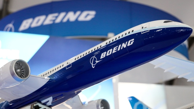 A model of Boeing Co. 787 Dreamliner aircraft. Photographer: SeongJoon Cho/Bloomberg