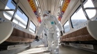 Workers disinfect a subway train in Gimpo, South Korea, Feb. 2020. Bloomberg