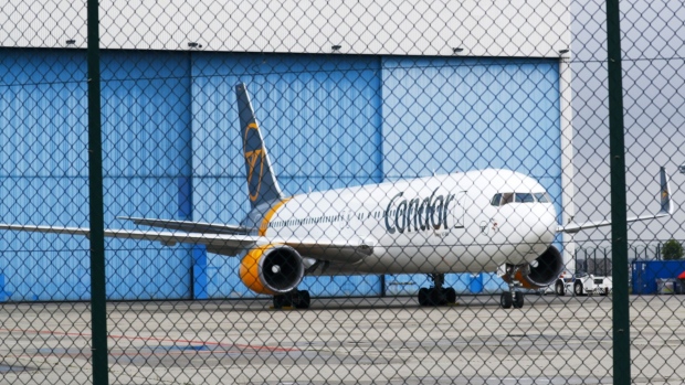 A Condor passenger aircraft at Frankfurt Airport. Photographer: Alex Kraus/Bloomberg