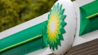 A BP Plc logo sits on a forecourt roof at filling station in Cambridge, U.K., on Monday, June 8, 2020. 