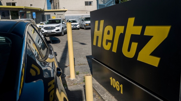 Signage for Hertz stands at a rental location in Berkeley, California on May 5. Photographer: David Paul Morris/Bloomberg