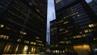 Office towers light up in the evening in the financial district of Toronto, Ontario, Canada, on Friday, May 22, 2020. 