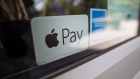 A sticker advertises Apple Pay as an accepted payment method at a restaurant in Norwich, U.K., on Tuesday, June 9, 2020. With the economy on course for its deepest recession for at least a century, the government is now paying the wages of more than 10 million workers to stave off mass unemployment. Photographer: Chris Ratcliffe/Bloomberg