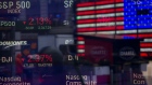 Monitors displaying stock market information. Bloomberg