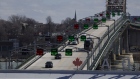 Traffic moves along the Peace Bridge border crossing between Canada and the U.S., in Fort Erie, Ontario, Canada, on Saturday, March 21, 2020.